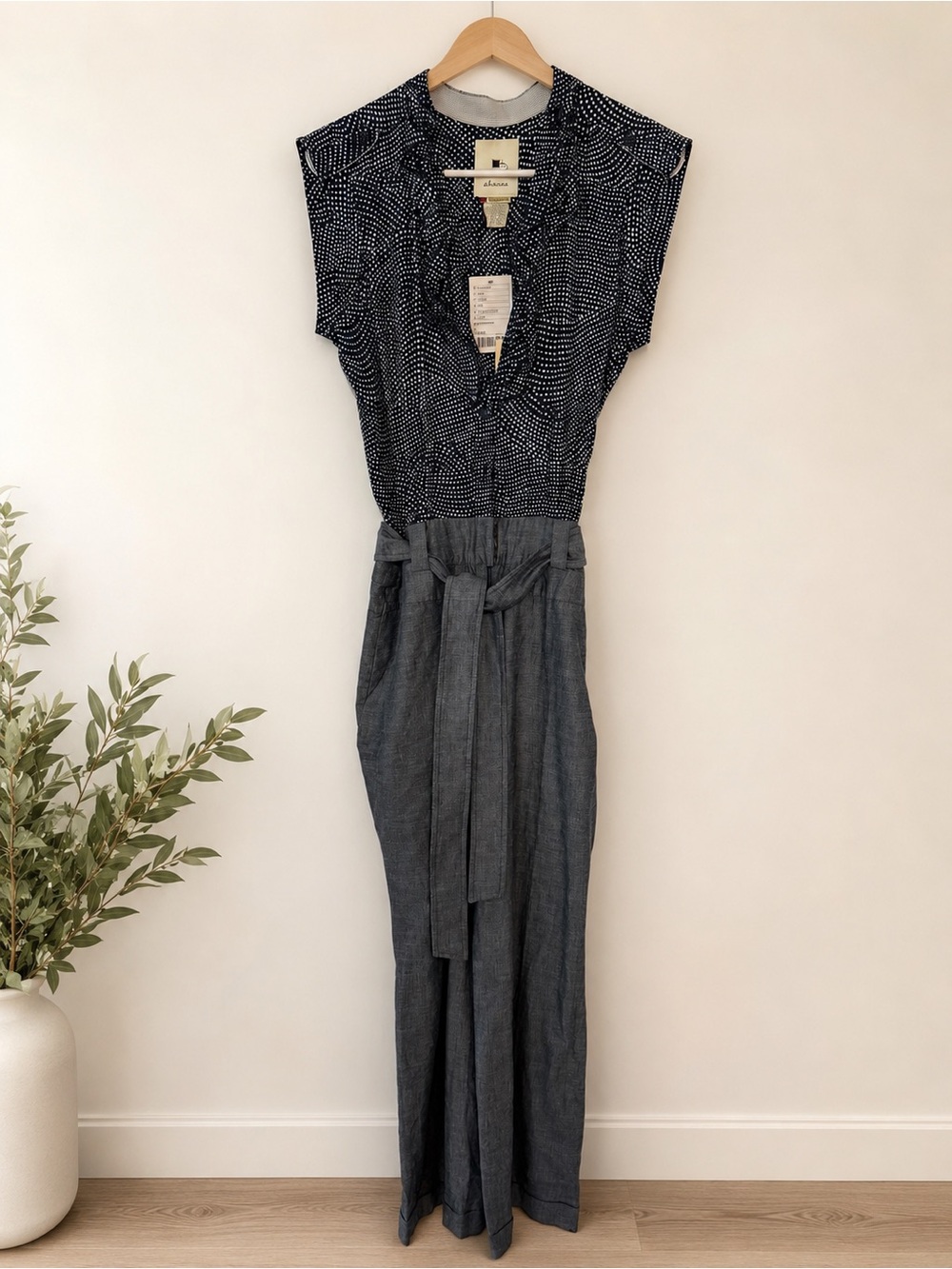 Elevenses for Anthropologie jumpsuit. Black & white polkadot shirt grey trousers